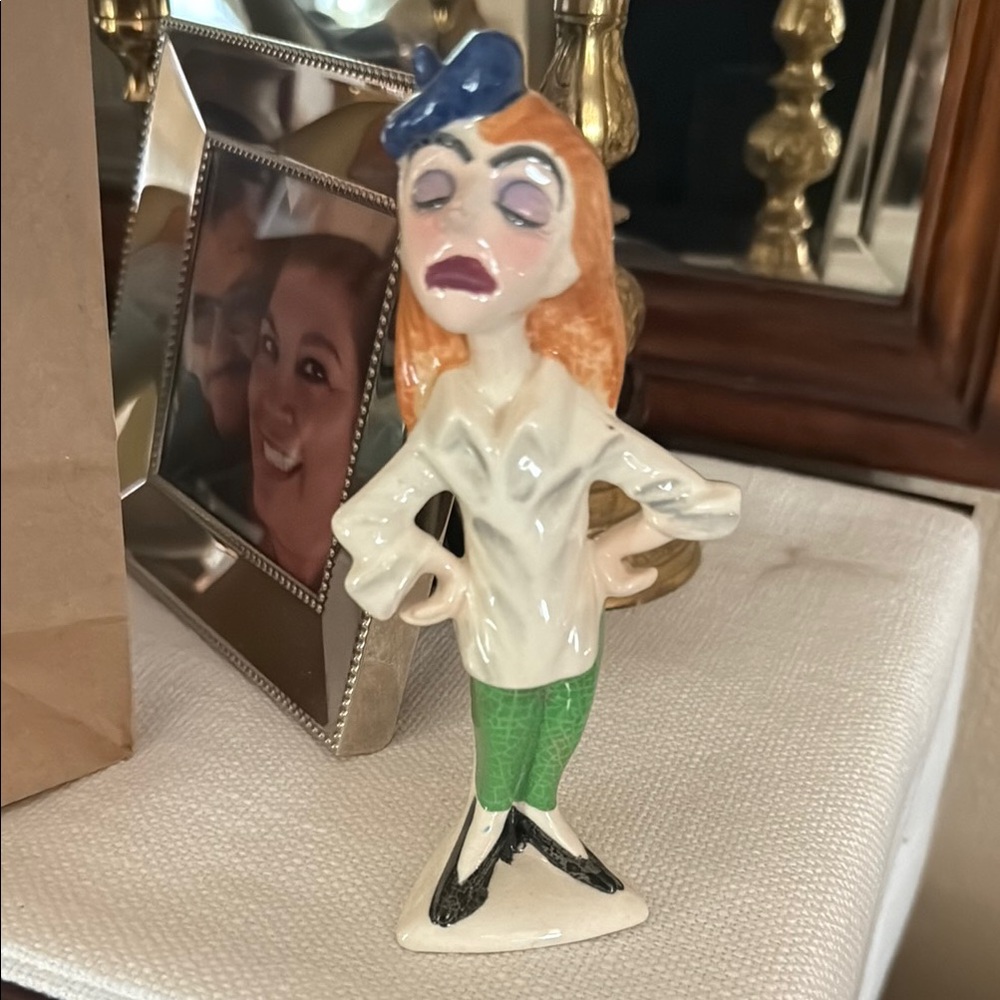 Handcrafted Ceramic Figurine with Blue and Green Accents